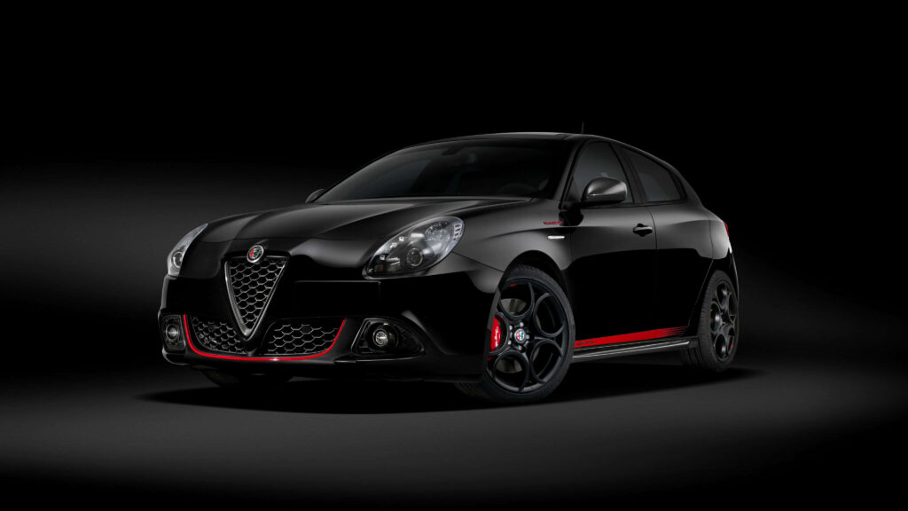 Alfa Romeo Giulietta sleek sporty car with bold lines and striking details on dark background Wallpaper