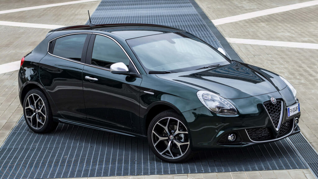 Alfa Romeo Giulietta parked outdoors with modern curves sporty design urban backdrop wallpaper