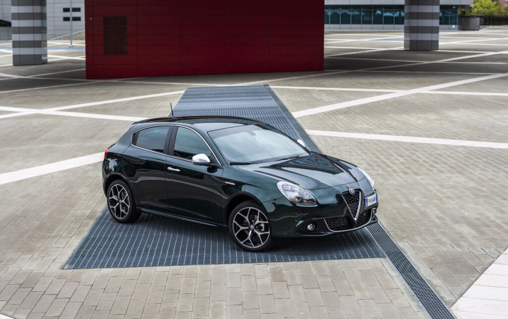 Alfa Romeo Giulietta wallpaper showing sleek sporty design and urban elegance background