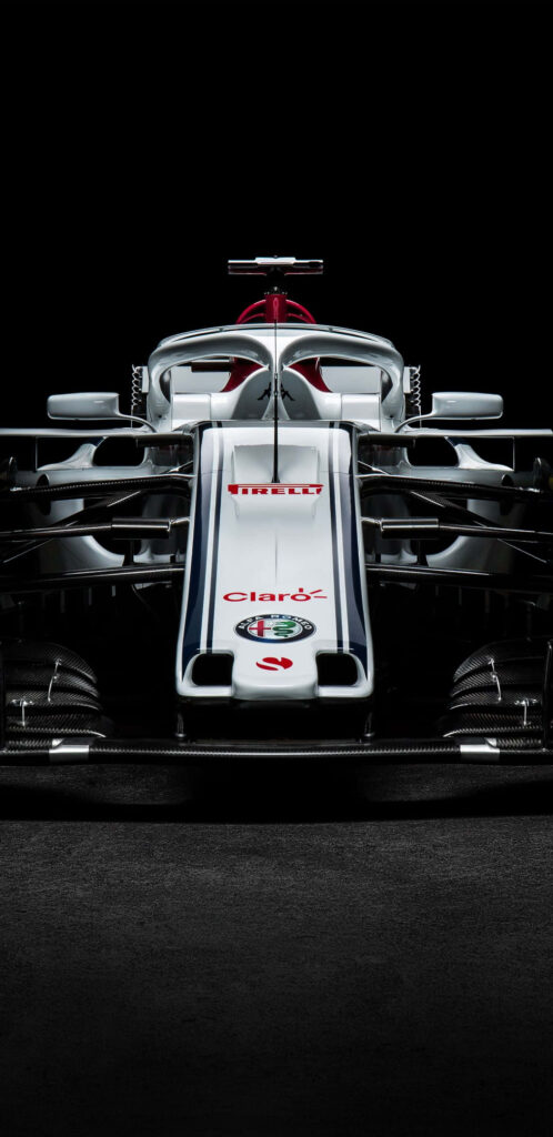 Front view of Alfa Romeo Racing F1 2018 car with sleek aerodynamics on dark wallpaper background