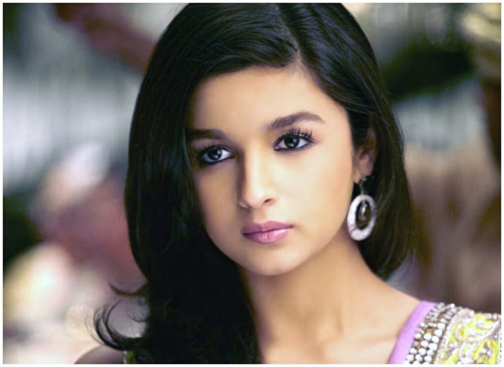 Alia Bhatt HD close-up wallpaper showing expressive eyes and elegant style for fans
