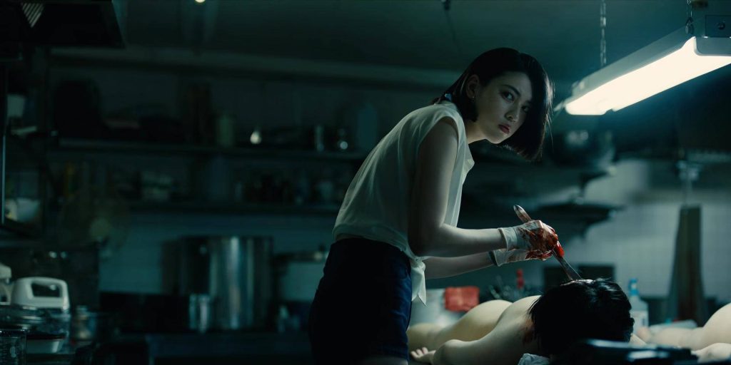 Ann conducting an autopsy in dim forensic lab dark cinematic Alice in Borderland wallpaper