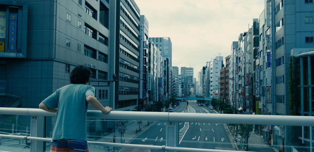 Alice in Borderland wallpaper Arisu overlooking deserted Tokyo overpass post-apocalyptic scene