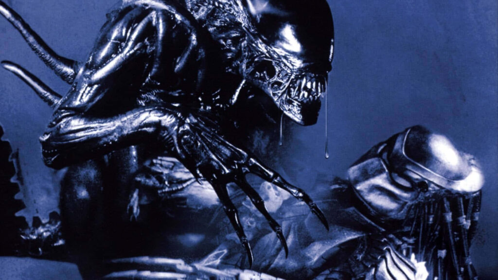 Alien Queen towering over fallen Predator in dark atmospheric Alien vs Predator intense scene wallpaper