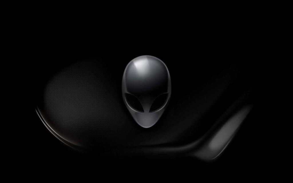 Glossy metallic Alienware logo on dark futuristic background perfect for gaming wallpaper