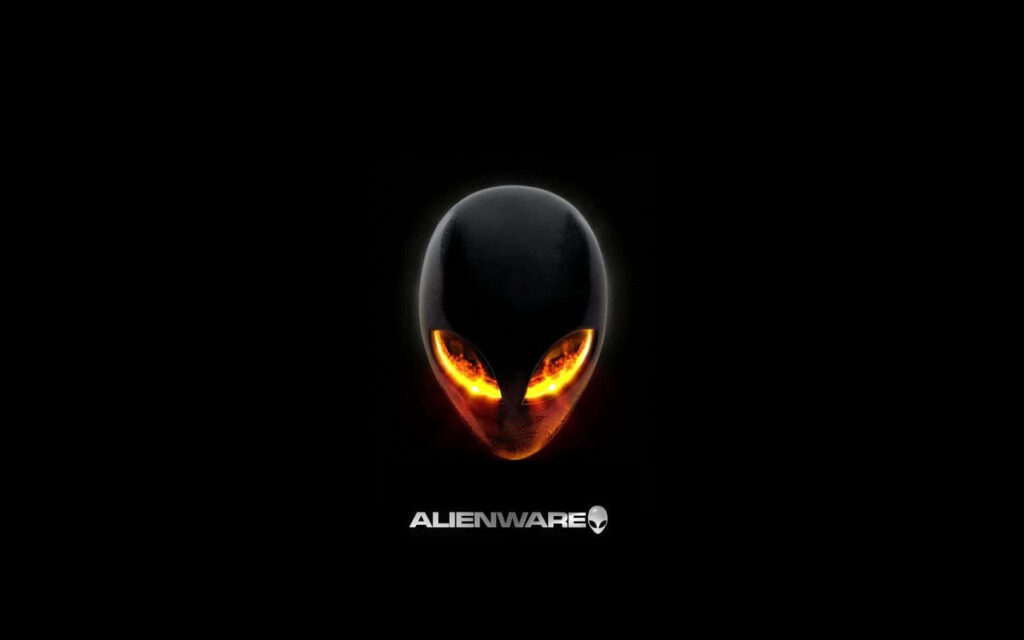 Alienware logo with fiery orange eyes on dark background symbolizing intense power and tech Wallpaper