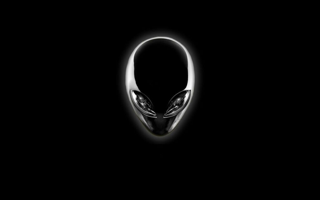 Alienware sleek metallic alien head logo on black background futuristic gaming wallpaper