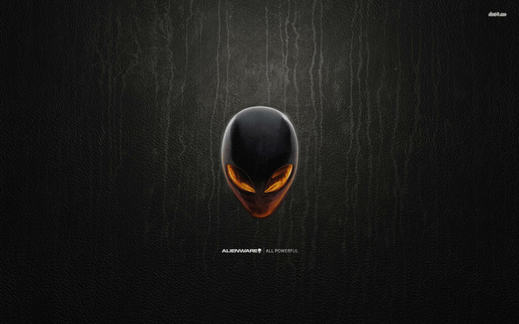 Alienware wallpaper with glowing orange alien head on dark textured background high definition gaming