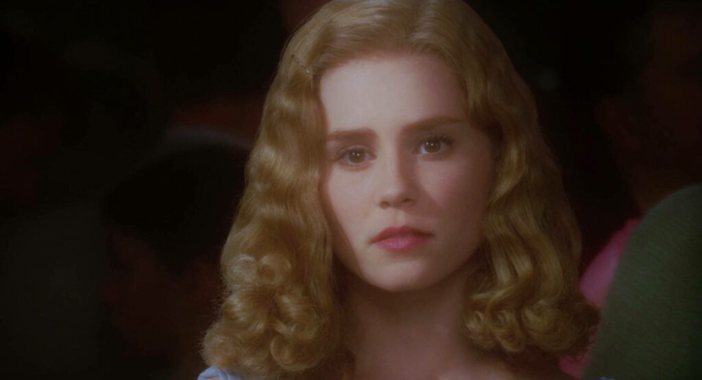 Alison Lohman in soft ethereal light with golden curls dramatic fantasy wallpaper background