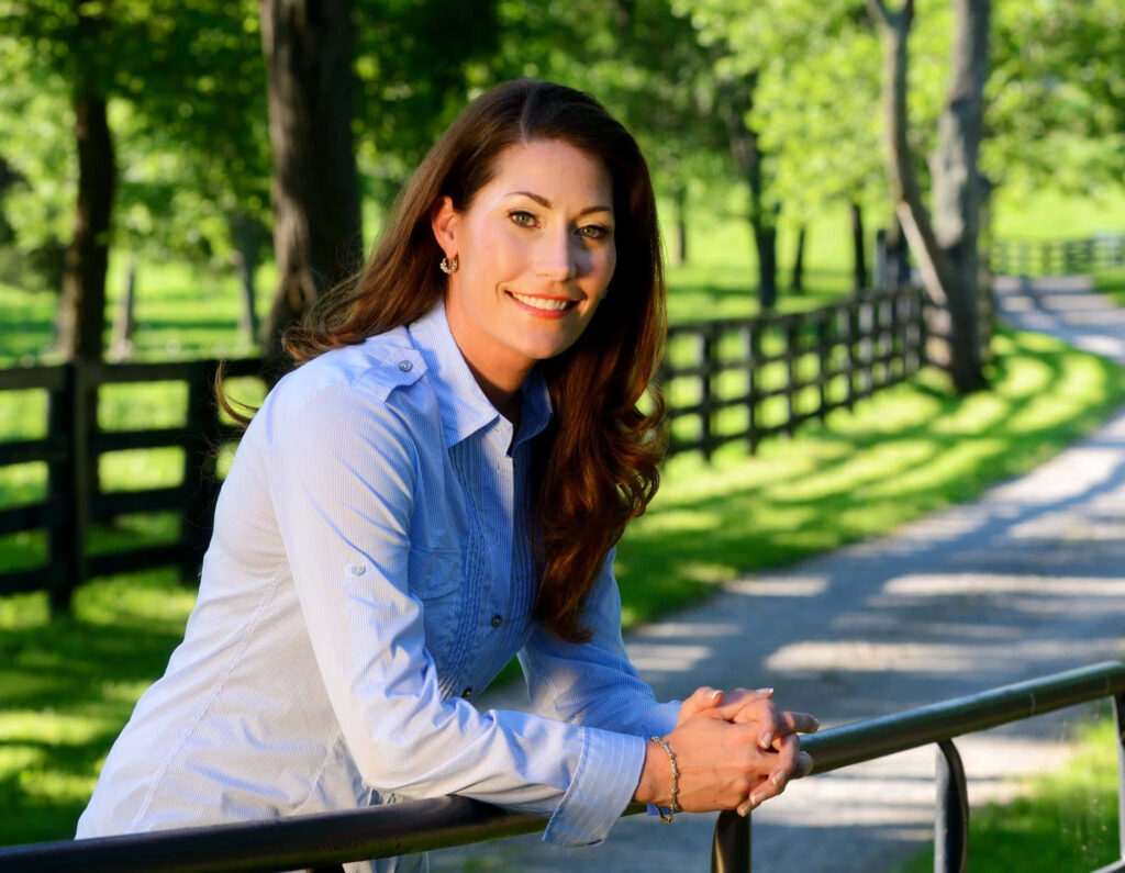Alison Lundergan Grimes outdoors by fence sunlight trees winding path serene wallpaper background