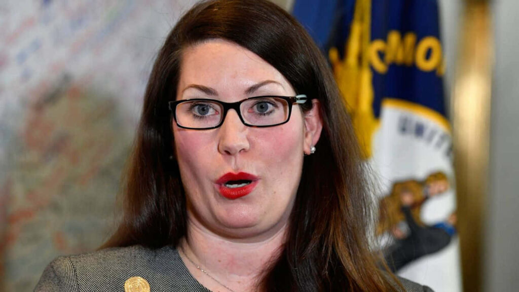 Professional portrait of Alison Lundergan Grimes with glasses flag and map background wallpaper