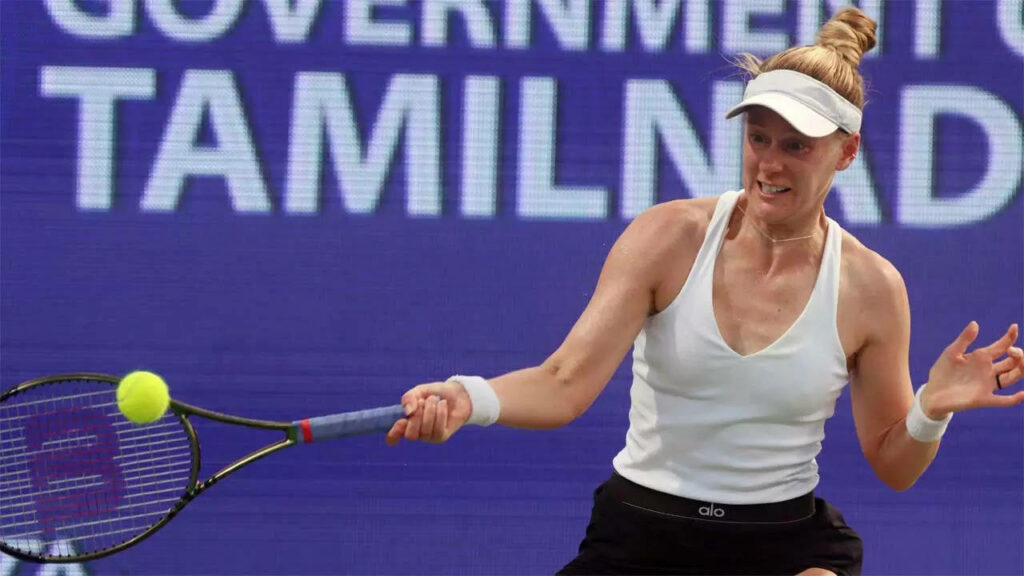 Alison Riske-Amritraj preparing to volley on tennis court showing focus and athleticism wallpaper