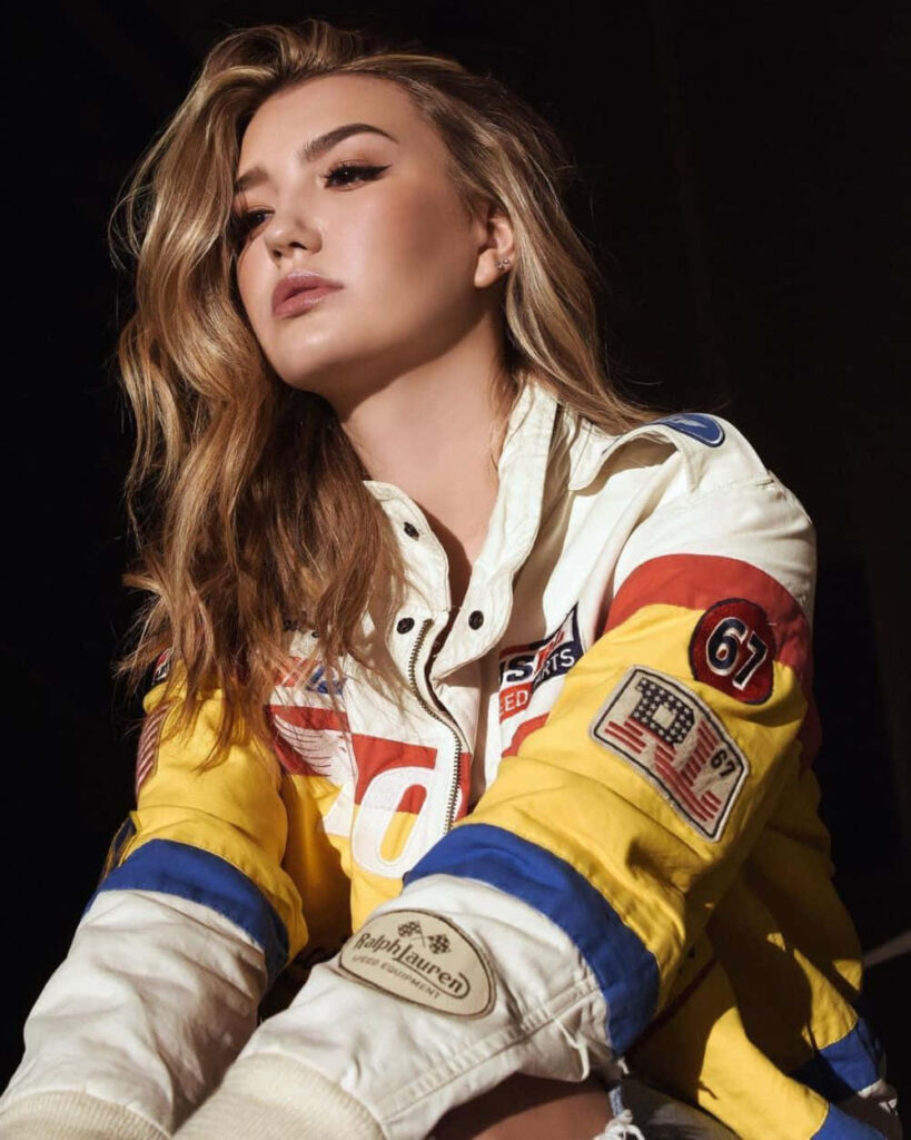 Alissa Skovbye confident portrait in stylish racing jacket showcasing modern sporty fashion wallpaper