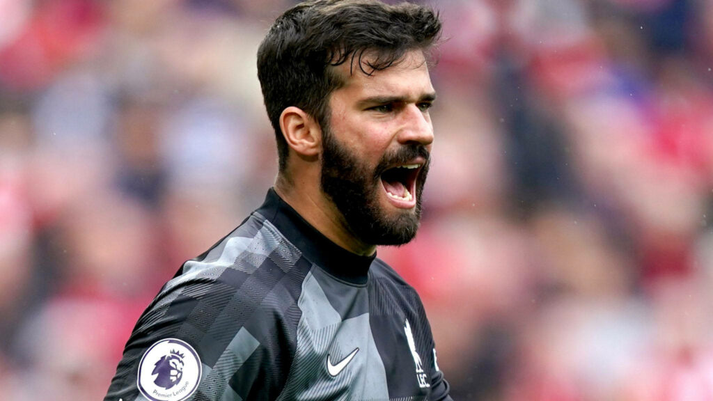 Alisson Becker goalkeeper showing intense passion and determination in dynamic football wallpaper