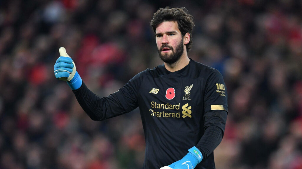 Alisson Becker Liverpool goalkeeper thumbs up confident focus on field during match wallpaper