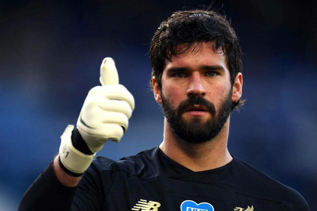 Alisson Becker close-up thumbs up confident positive football player wallpaper background