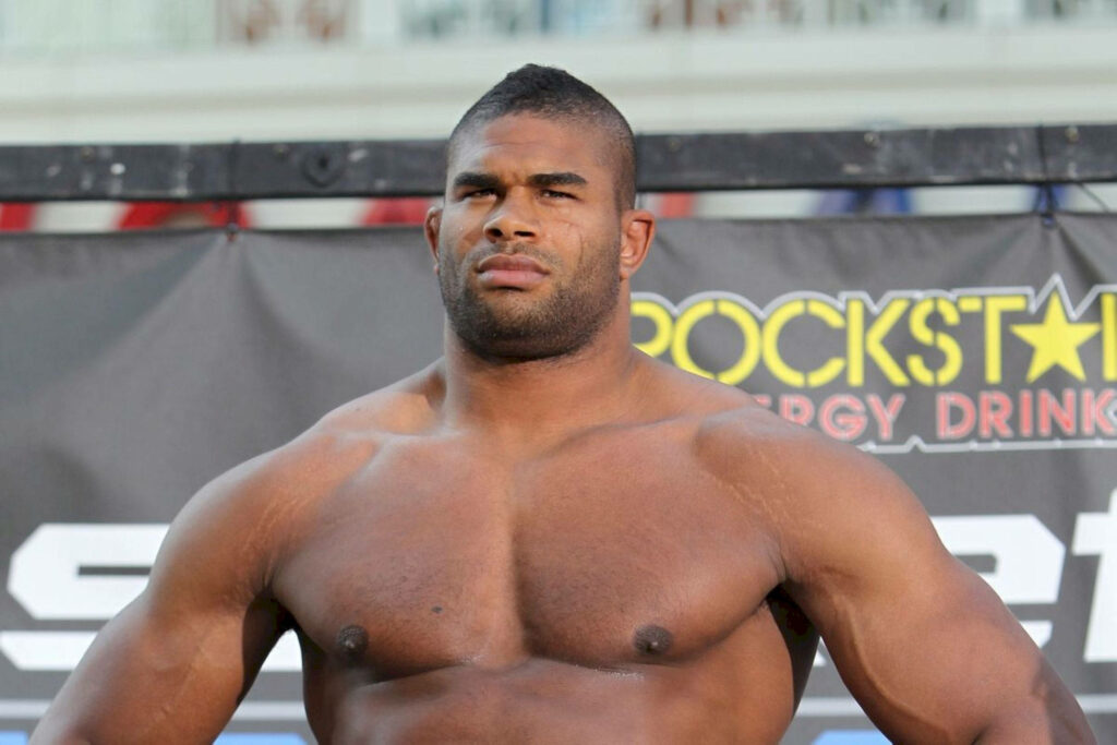 MMA fighter Alistair Overeem powerful front pose intense focus strong physique wallpaper background