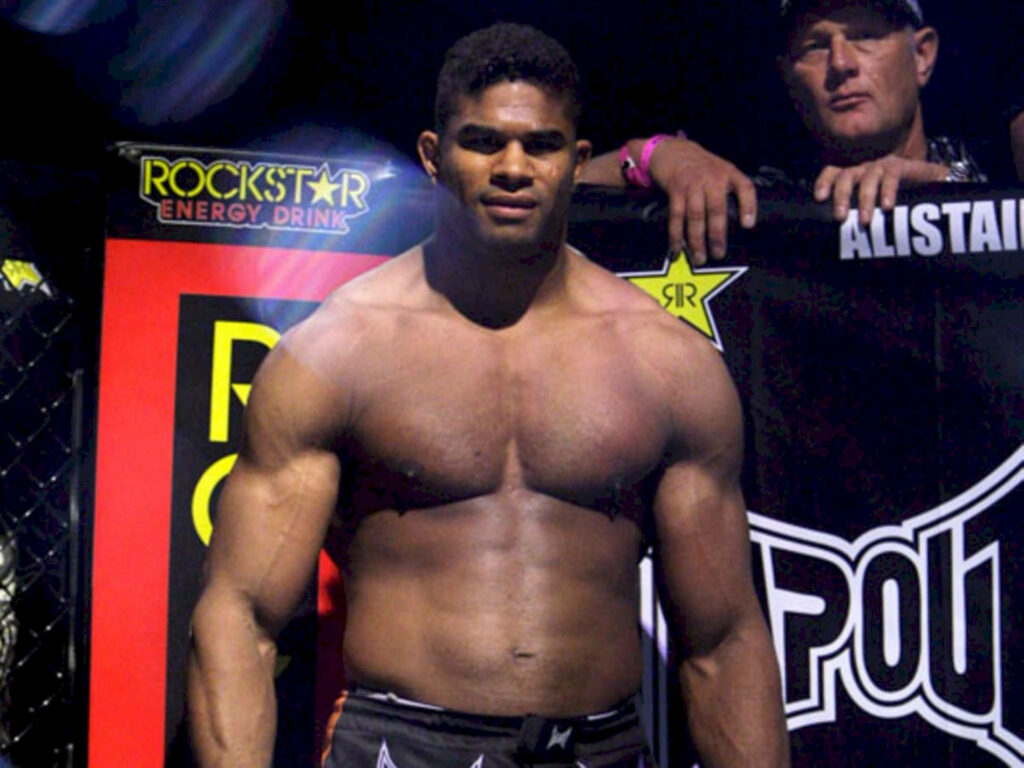 Alistair Overeem in the ring showing muscular physique strength and athletic power wallpaper