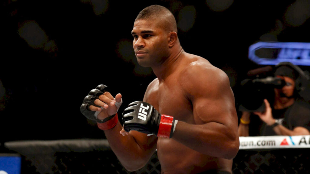 Alistair Overeem in UFC octagon boxing stance showing powerful physique and fighting spirit Wallpaper