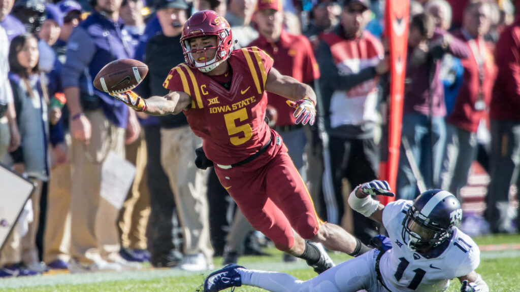 Allen Lazard athletic football catch in action on field dynamic game moment wallpaper background