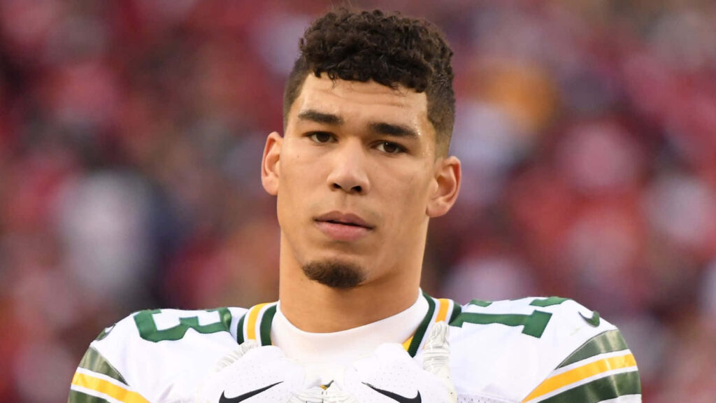 Allen Lazard Green Bay Packers close-up portrait focused determined stadium background Wallpaper