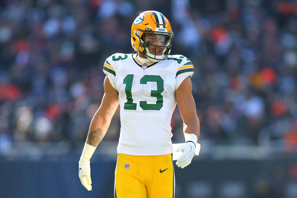 Allen Lazard focused in Green Bay Packers uniform ready for game day football action wallpaper