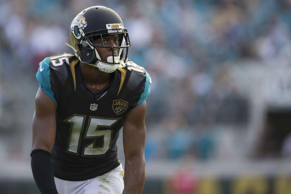 Allen Robinson Jacksonville Jaguars NFL player focused on field dynamic football wallpaper background