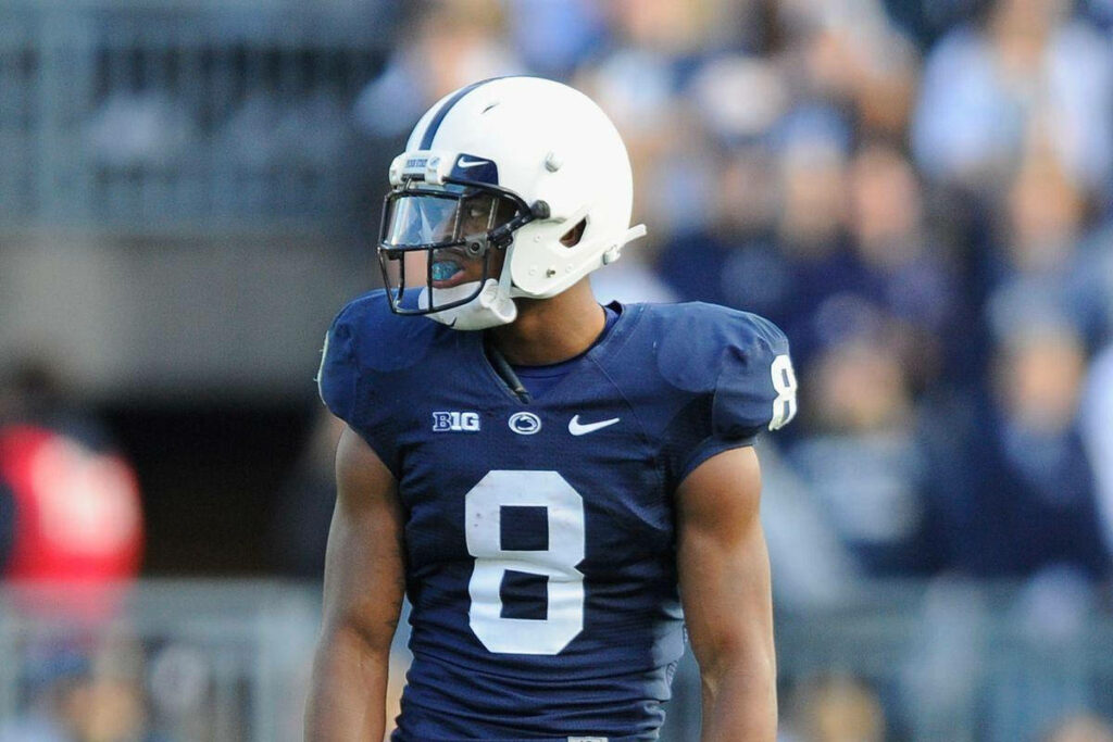 Allen Robinson in Penn State Nittany Lions uniform focused on college football field background Wallpaper