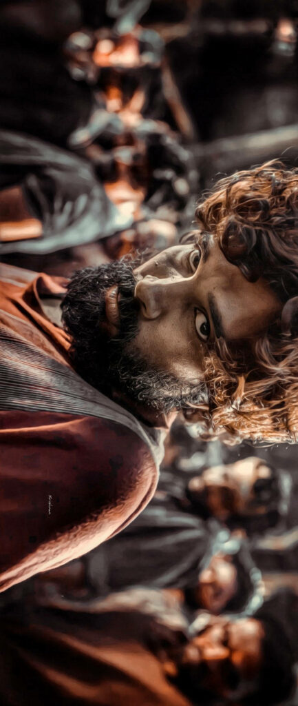 Dark themed Pushpa wallpaper featuring Allu Arjun intense expression rugged movie atmosphere