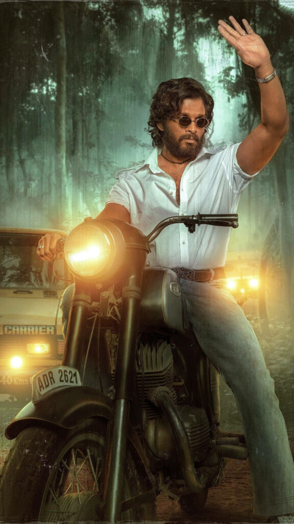 Allu Arjun as Pushpa riding vintage motorcycle in misty forest confidently waving wallpaper
