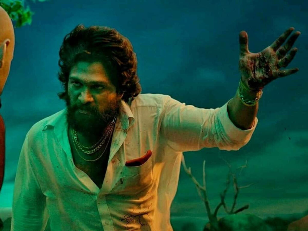 Allu Arjun as Pushpa fierce and angry confronting Bhanwar Singh intense dramatic lighting wallpaper