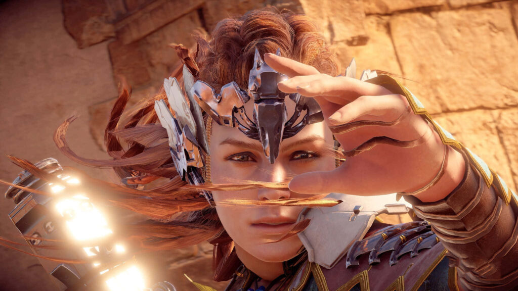 Aloy reaching forward determined in Horizon Forbidden West wallpaper for epic adventure fans