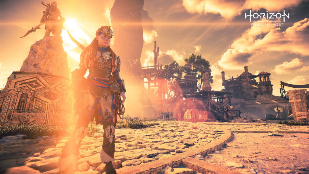 Aloy stands confidently in sunlit ruins with dramatic skies in Horizon Forbidden West wallpaper