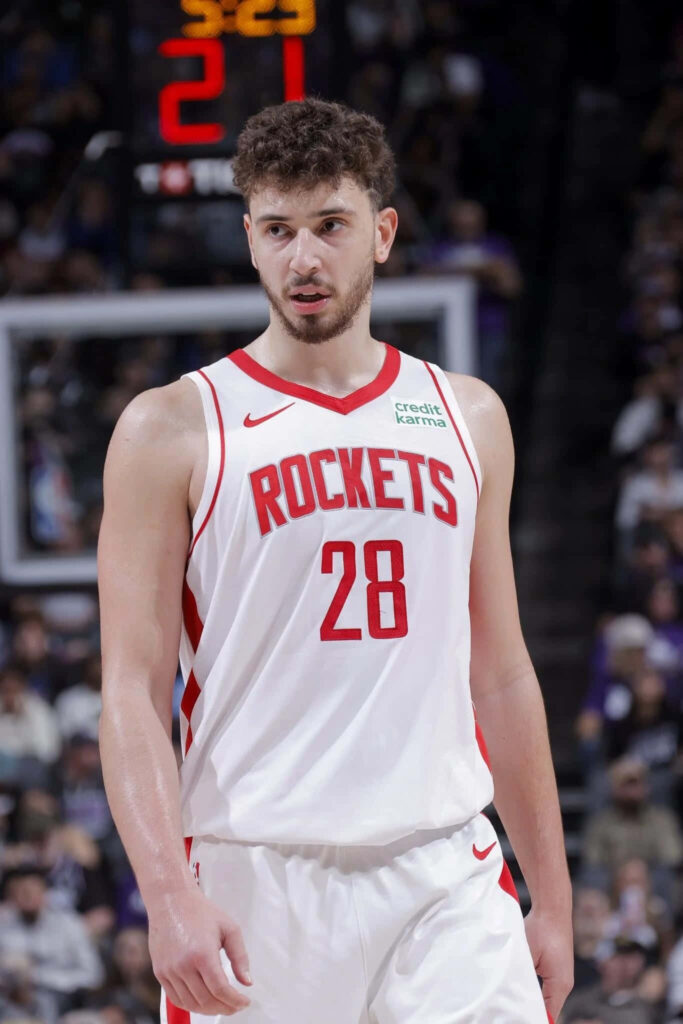 Alperen Şengün Houston Rockets number 28 basketball player ready for action on court wallpaper