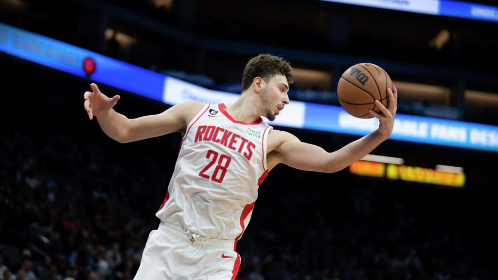 Alperen Şengün Houston Rockets dynamic basketball move intense game action wallpaper background