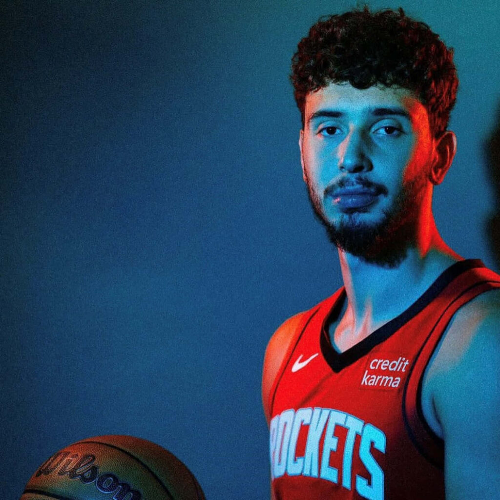 Alperen Şengün Houston Rockets jersey dramatic lighting dynamic basketball portrait wallpaper