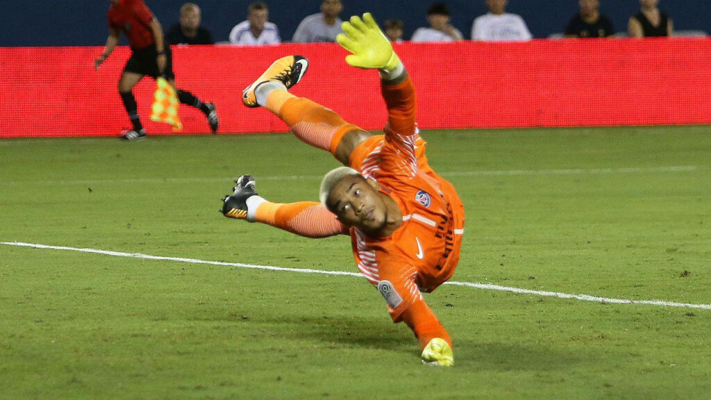 Alphonse Areola diving save goalkeeper agility focus soccer action wallpaper background