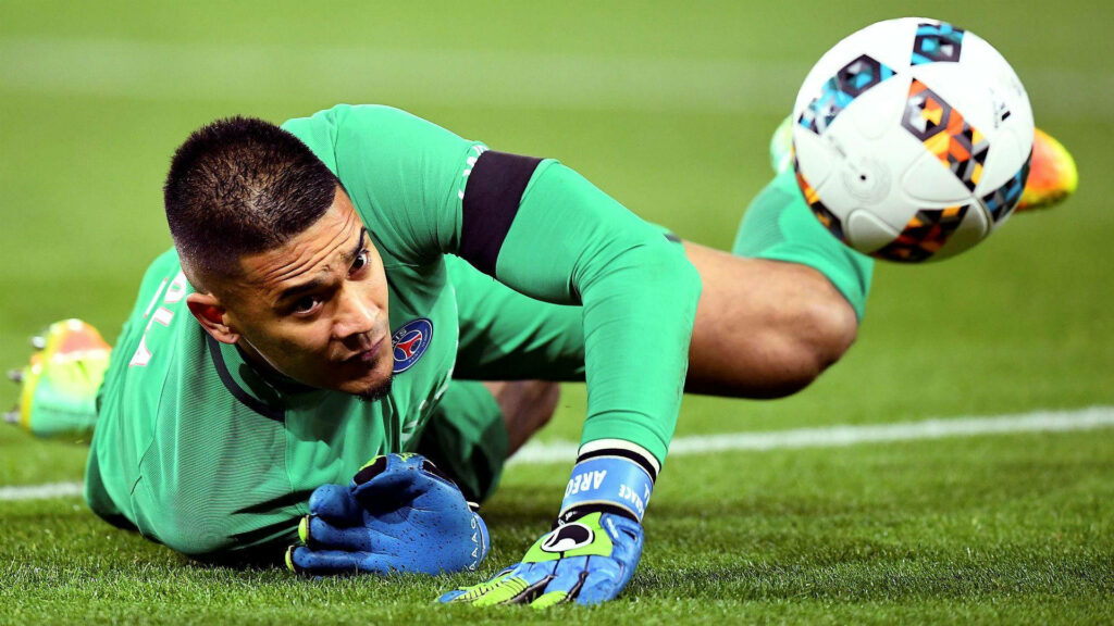 Alphonse Areola goalkeeper in action diving to save ball during soccer match on field wallpaper