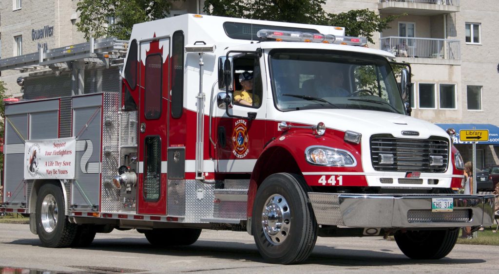 Altona Rhineland fire truck 441 with maple leaf and Support Your Firefighters banner downtown Wallpaper