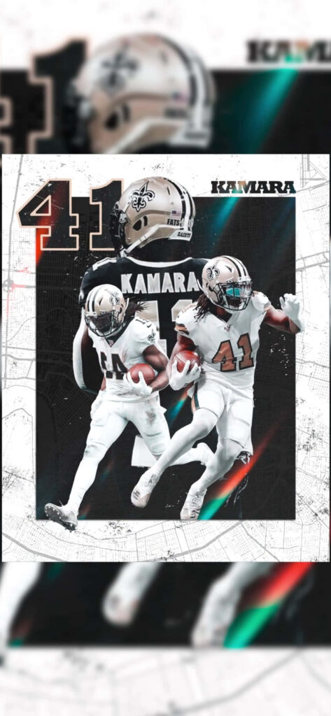 Alvin Kamara New Orleans Saints running back charging down field showing agility and power Wallpaper