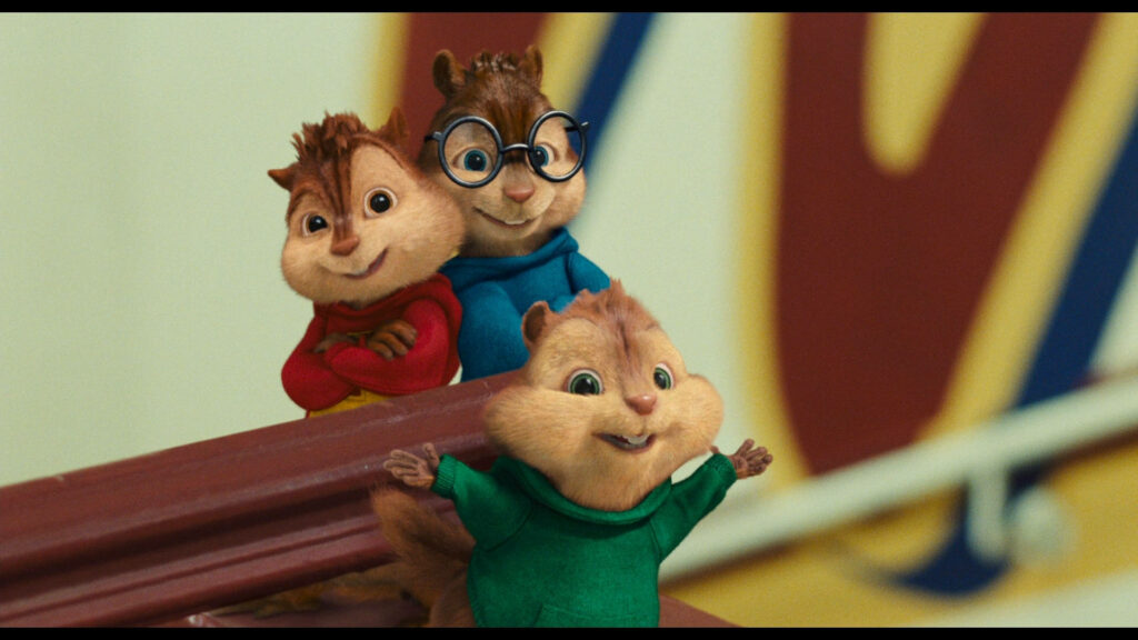 Alvin Simon and Theodore from Alvin and the Chipmunks smiling together colorful playful wallpaper background