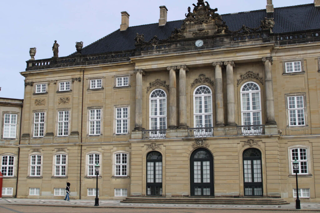 Amalienborg Palace wallpaper showcasing stately columns intricate windows and classic European architecture
