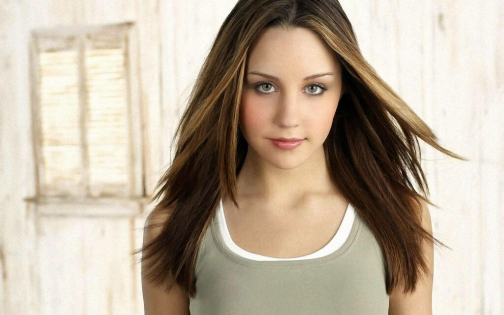 Amanda Bynes stylish confident pose natural beauty neutral background wallpaper image