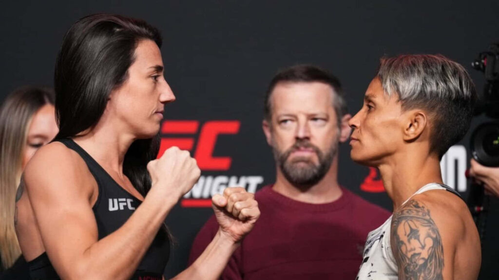 Amanda Lemos MMA fighter showing championship spirit confidently facing opponent pre fight Wallpaper