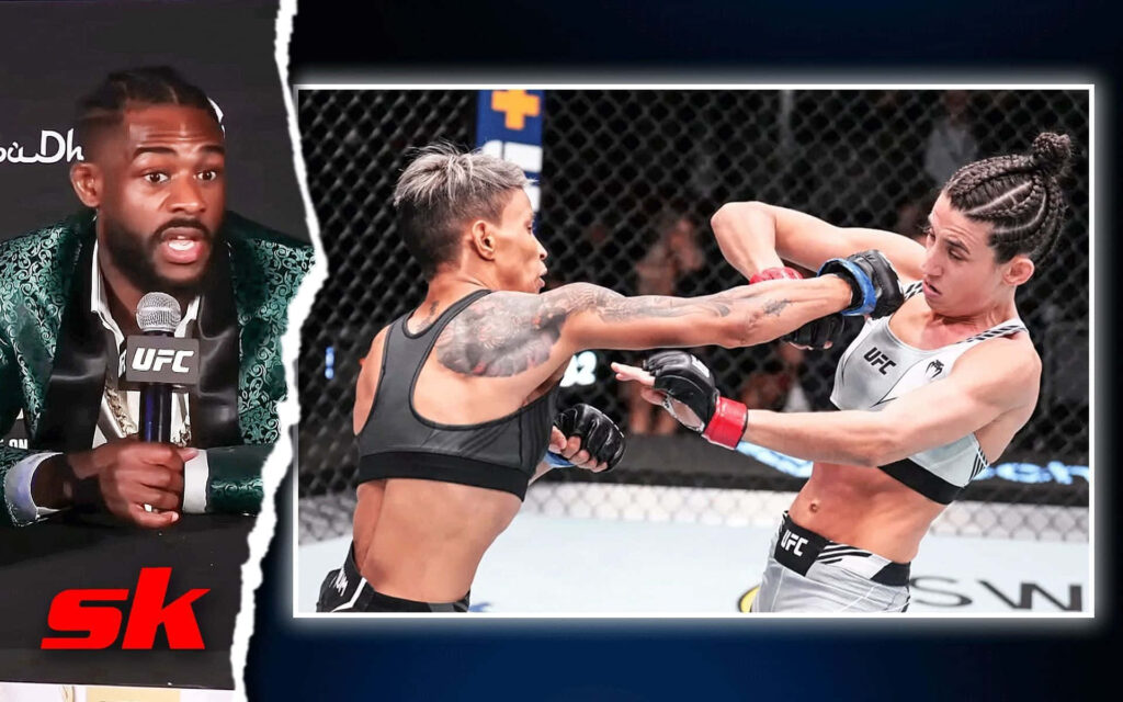 Amanda Lemos delivers a powerful punch inside the octagon during an intense UFC Fight Night bout Wallpaper