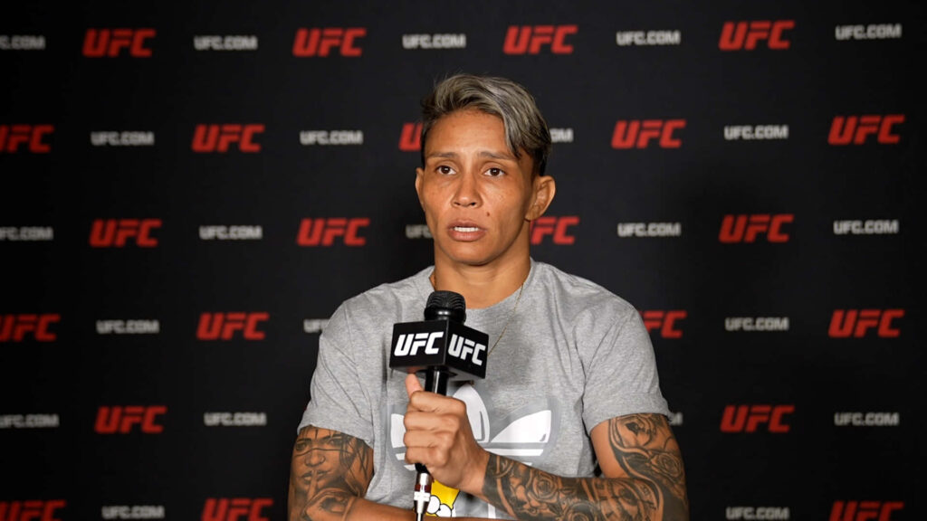 Amanda Lemos UFC press conference holding microphone strong focused female fighter wallpaper background