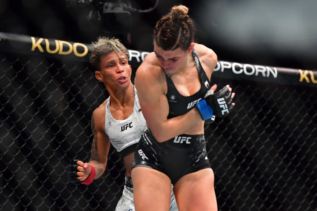 Amanda Lemos powerful UFC strike intense mixed martial arts action inside octagon wallpaper background