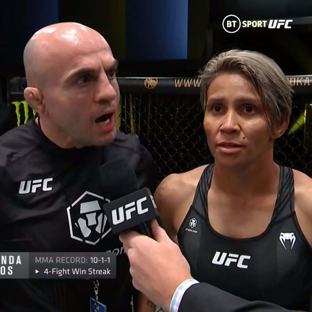 Amanda Lemos in UFC octagon post-fight interview showing determination and focus wallpaper