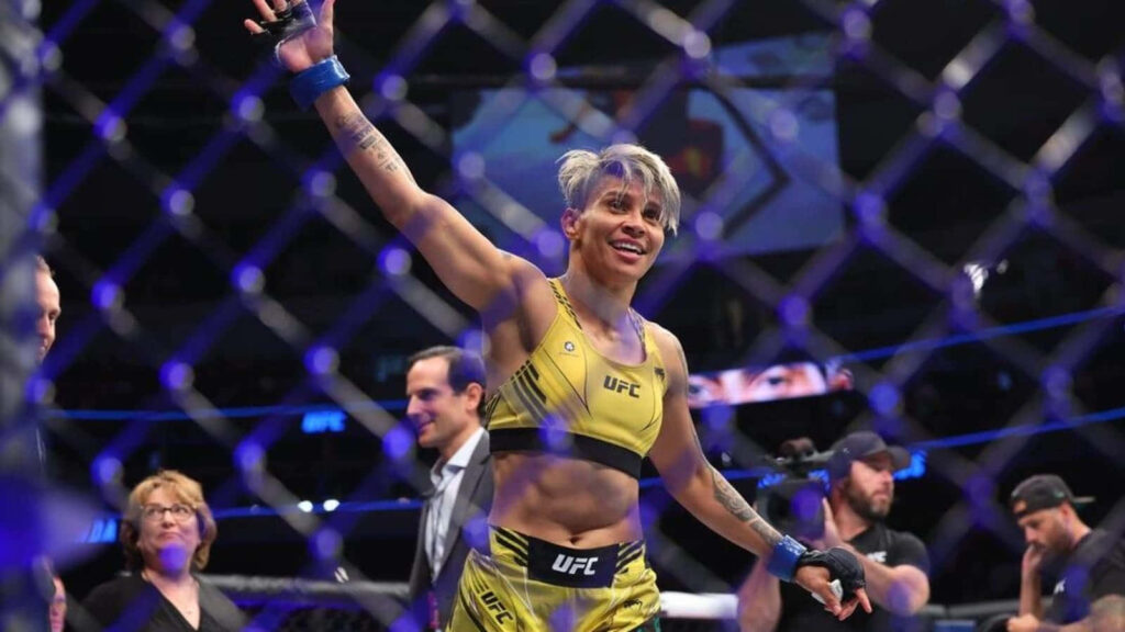 Amanda Lemos celebrating in UFC octagon showing strength and determination during training Wallpaper