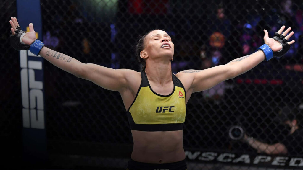 Amanda Lemos victorious in octagon showing strength and determination mixed martial arts wallpaper